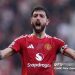 Bruno Fernandes of Manchester United celebrates after scoring their side's first goal during the Premier League match between Manchester United FC and Arsenal FC at Old Trafford on March 09, 2025 in Manchester, England. (Photo by Alex Livesey - Danehouse/Getty Images)