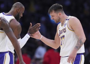 Luka Doncic celebrates with LeBron James Photo Courtesy: AP