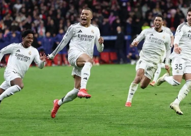 Real Madrid players celebrate win over Atletico in penalty shootout Photo Courtesy: Getty Images