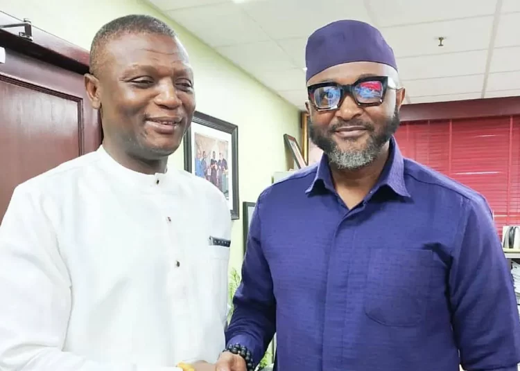 Kofi Adams with Yaw Ankrah. Photo Courtesy: Happy Fm