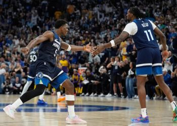 Anthony Edwards celebrates with Naz Reid (right) Photo Courtesy: AP