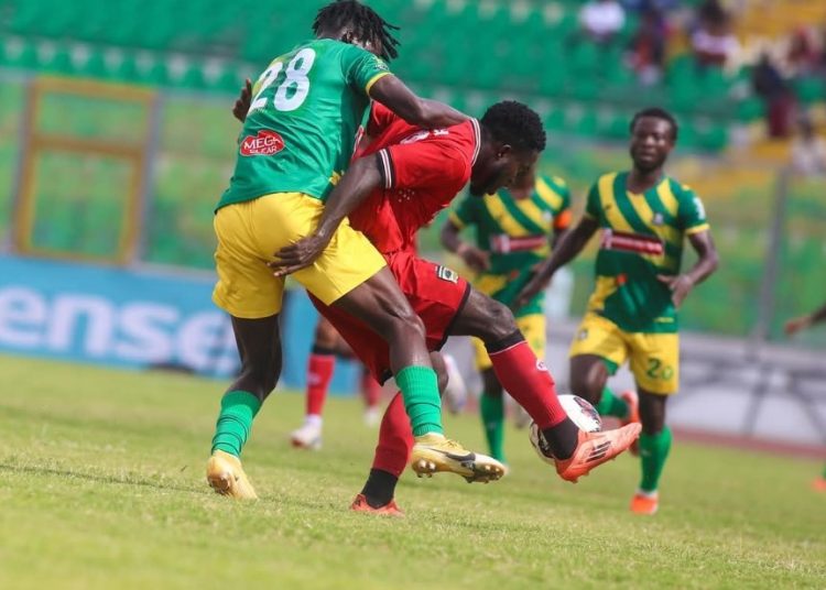 Shot from Kotoko (red)-Aduana Stars game Photo Courtesy: AKSC