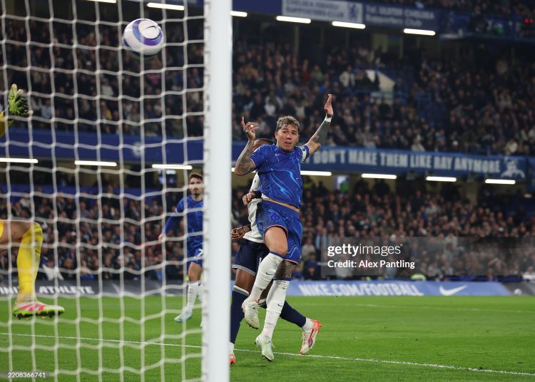 Enzo Fernandez of Chelsea heads the ball to score (Photo by Alex Pantling/Getty Images)