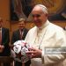 Pope Francis holds a gift of FC Bayern Muenchen during an private audience with the team of  FC Bayern Muenchen (Photo by Alexander Hassenstein/Bongarts/Getty Images)