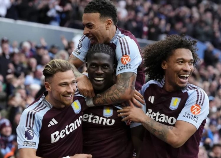 Aston Villa players celebrate goal against Newcastle Photo Courtesy: Getty Images