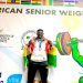 Gabriel Owusu proudly displaying his medals