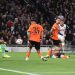 Tottenham Hotspur's James Maddison sees his second half shot saved by Kaua Santos during the UEFA Europa League 2024/25 Quarter Final First Leg match ondon, England. (Photo by Rob Newell - CameraSport via Getty Images)