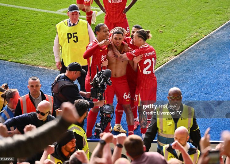 Trent Alexander-Arnold celebrates scoring his team's first goal with teammates during the Premier League match between Leicester City FC and Liverpool FC(Photo by Liverpool FC/Liverpool FC via Getty Images)