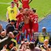 Trent Alexander-Arnold celebrates scoring his team's first goal with teammates during the Premier League match between Leicester City FC and Liverpool FC(Photo by Liverpool FC/Liverpool FC via Getty Images)