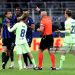 Referee Szymon Marciniak approaches Francesco Acerbi of FC Internazionale as he is held back by Pedri of FC Barcelona (Photo by Marco Luzzani/Getty Images)
