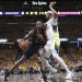 Evan Mobley (with ball) is defended by Myles Turner Photo Courtesy: AP