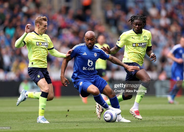 Jordan Ayew of Leicester City is put under pressure by Lesley Ugochukwu and Flynn Downes of Southampton (Photo by Alex Pantling/Getty Images)