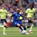 Jordan Ayew of Leicester City is put under pressure by Lesley Ugochukwu and Flynn Downes of Southampton (Photo by Alex Pantling/Getty Images)