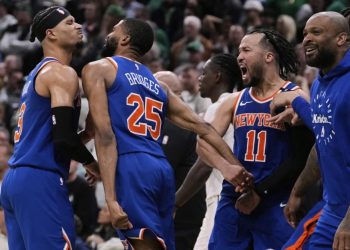 New York Knicks celebrate win over Boston Celtics Photo Courtesy: AP
