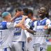 Auxerre's Ghanian defender #14 Gideon Mensah (R) celebrates his goal (Photo by ARNAUD FINISTRE/AFP via Getty Images)