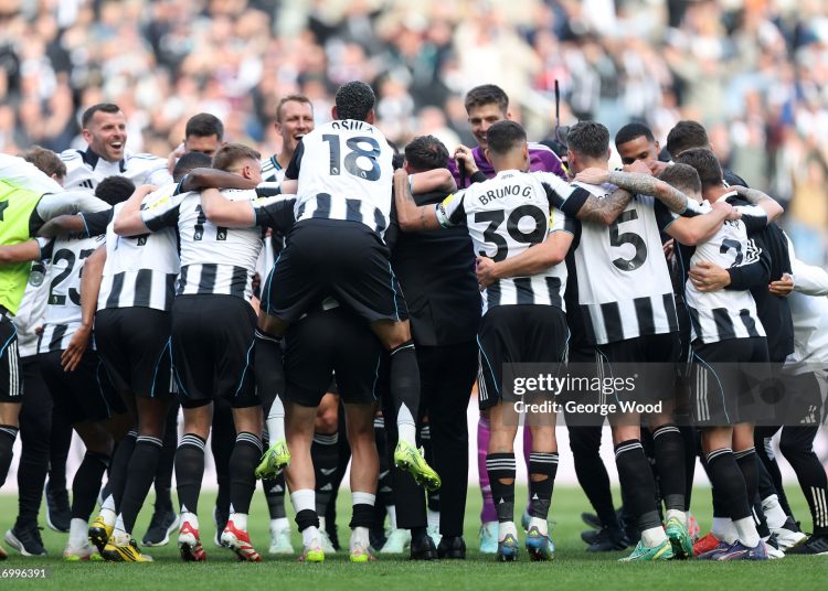 The Newcastle United team celebrate qualifying for the UEFA Champion's league (Photo by George Wood/Getty Images)