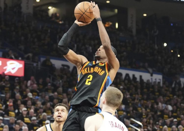 Shai Gilgeous-Alexander attempts shot against Denver Nuggets Photo Courtesy: AP