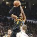 Shai Gilgeous-Alexander attempts shot against Denver Nuggets Photo Courtesy: AP