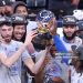Chet Holmgren #7 of the Oklahoma City Thunder and teammates raise the Oscar Robertson Trophy after defeating the Minnesota Timberwolves 124-94 in Game Five of the Western Conference Finals (Photo by William Purnell/Getty Images)