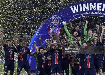 Marquinhos, of Paris Saint-Germain, holds  the UEFA Champions League Trophy (Photo by Isabella Bonotto/Anadolu via Getty Images)
