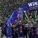 Marquinhos, of Paris Saint-Germain, holds the UEFA Champions League Trophy (Photo by Isabella Bonotto/Anadolu via Getty Images)