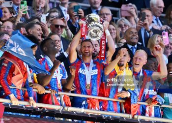 Joel Ward of Crystal Palace the FA Cup trophy after their team's victory in the Emirates FA Cup Final (Photo by Mike Hewitt/Getty Images)