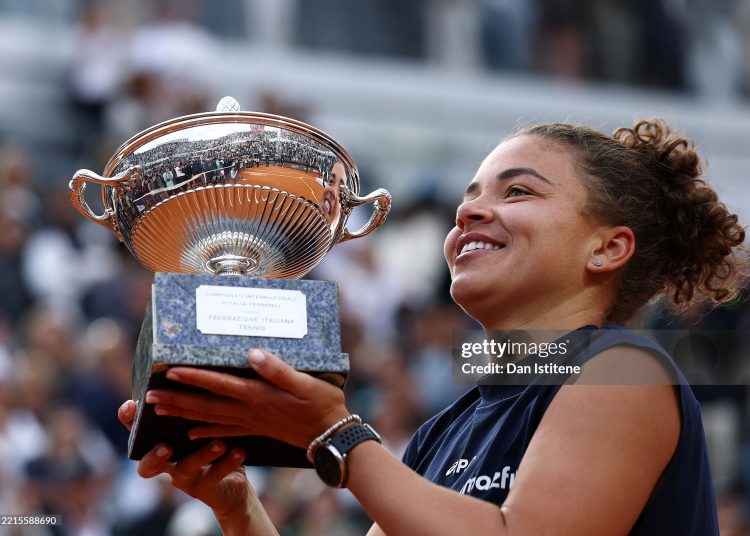 Jasmine Paolini of Italy poses for a photo with the trophy following victory against Coco Gauff of United States in the Women's Singles Final match (Photo by Dan Istitene/Getty Images)