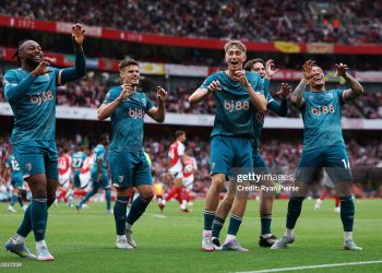 Dean Huijsen of AFC Bournemouth celebrates scoring his team's first goal with Antoine Semenyo (extreme left) and teammates (Photo by Ryan Pierse/Getty Images)