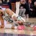 Jayson Tatum #0 of the Boston Celtics lays on the ground after being injured against the New York Knicks (Photo by Elsa/Getty Images)