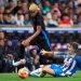 Lamine Yamal of FC Barcelona competes for the ball with Carlos Romero of RCD Espanyol (Photo by Pedro Salado/Getty Images)