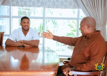 Anthony Joshua (left) with President Mahama