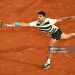 Carlos Alcaraz of Spain plays a forehand against Lorenzo Musetti of Italy (Photo by Lionel Hahn/Getty Images)