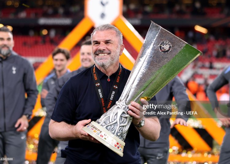 Ange Postecoglou, Manager of Tottenham Hotspur, celebrates with the UEFA Europa League trophy after his team's victory in the UEFA Europa League Final (Photo by Alex Pantling - UEFA/UEFA via Getty Images)