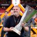 Ange Postecoglou, Manager of Tottenham Hotspur, celebrates with the UEFA Europa League trophy after his team's victory in the UEFA Europa League Final (Photo by Alex Pantling - UEFA/UEFA via Getty Images)