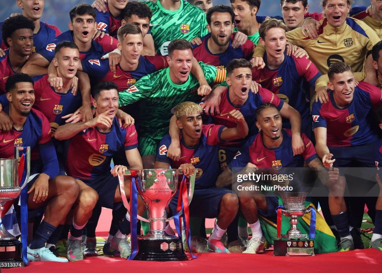 FC Barcelona players celebrate their league championship victory at the end of the match between FC Barcelona and Villarreal CF, corresponding to week 37 of LaLiga EA Sports, played at the Olympic Stadium Lluis Companys, in Barcelona, Spain, on May 18, 2025. (Photo by Joan Valls/Urbanandsport/NurPhoto via Getty Images)
