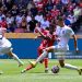 Kingsley Coman of Bayern (C) attempts a kick for score his goal over Thomas Mitchel of Auckland City (R) during the FIFA Club World Cup 2025 (Photo by Marcio Machado/Eurasia Sport Images/Getty Images)