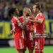 Michael Olise (L),  Konrad Laimer (C) and Harry Kane (R) of FC Bayern Munchen celebrate after winning the FIFA Club World Cup 2025 (Photo by Hugo Rivera/Jam Media/Getty Images)