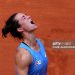 France's Lois Boisson celebrates after winning her women's singles match against US Jessica Pegula on day 9 of the French Open tennis tournament (Photo by ALAIN JOCARD/AFP via Getty Images)
