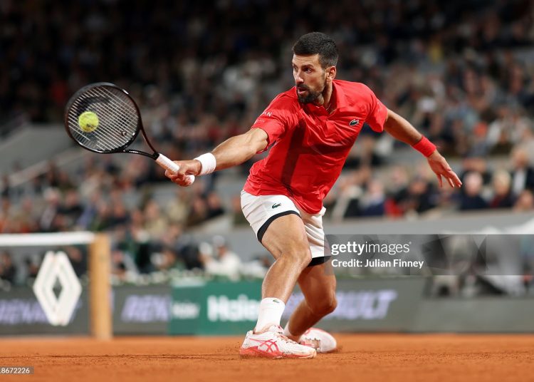 Novak Djokovic of Serbia plays a backhand against Alexander Zverev of Germany (Photo by Julian Finney/Getty Images)