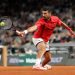 Novak Djokovic of Serbia plays a backhand against Alexander Zverev of Germany (Photo by Julian Finney/Getty Images)
