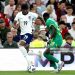 Noni Madueke of England controls the ball under pressure from El Hadji Malick Diouf of Senegal (Photo by Eddie Keogh - The FA/The FA via Getty Images)