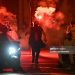 Paris Saint-Germain (PSG) supporters gather holding flares on a street in Paris early June 1, 2025, during celebrations following their 5-0 victory (Photo by LOU BENOIST/AFP via Getty Images)