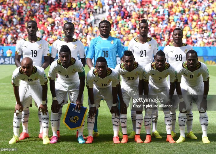 Team of Ghana poses (back L-R) Jonathan Mensah, Mohammed Rabiu, goalkeeper Fatawu Dauda, John Boye, Kwadwo Asamoah, (front L-R) Andre Ayew , Asamoah Gyan, Majeed Waris, Harrison Afful, Christian Atsu, Emmanuel Badu for a group photo before the FIFA World Cup 2014 group G preliminary round match between Portugal and Ghana at the Estadio National Stadium in Brasilia, Brazil, on 26 June 2014. (Photo by Marius Becker/picture alliance via Getty Images)