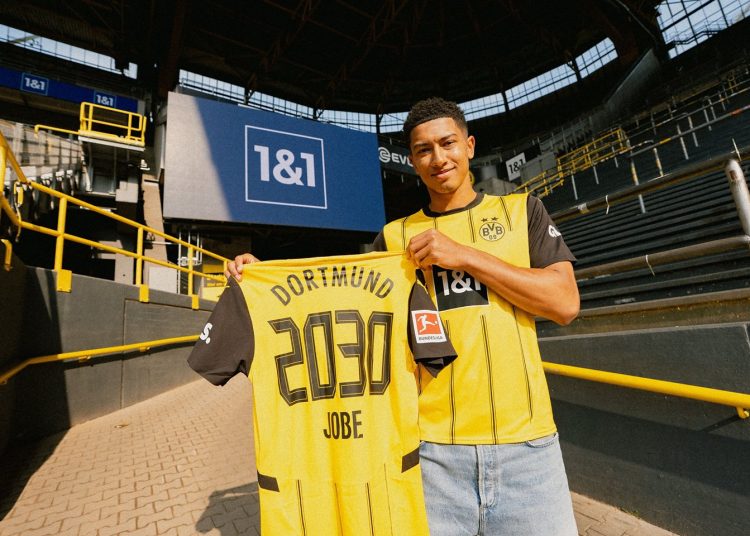 Jobe Bellingham poses with Borussia Dortmund Jersey Photo Courtesy: Dortmund