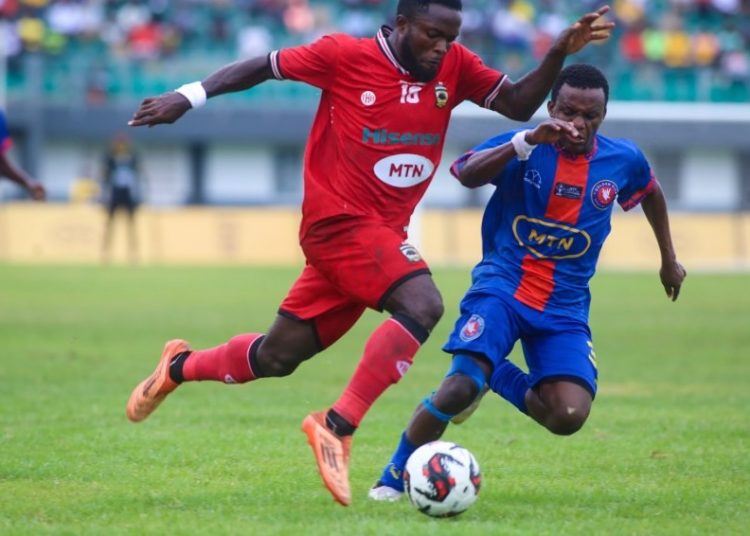Albert Amoah of Kotoko (red) in action against Golden Kick in 2025 FA Cup Final Photo Courtesy: AKSC