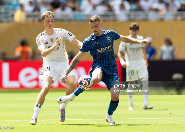Dean Huijsen of Real Madrid C.F. (1) and Sergej Milinkovic-Savic of Al Hilal (1) during the group H match at the FIFA Club World Cup (Photo by Simon Bruty/Anychance/Getty Images)