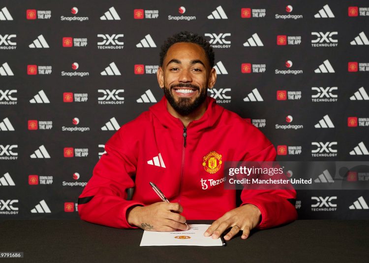 Matheus Cunha of Manchester United signing his contract with the club  (Photo by Manchester United/Manchester United via Getty Images)