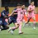 Lionel Messi #10 of Inter Miami CF runs with the ball while under pressure from Nuno Mendes #25 and Joao Neves #87 of Paris Saint-Germain during the FIFA Club World Cup 2025 (Photo by Alex Grimm/Getty Images)