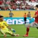 Al Ahly's Egyptian midfielder #22 Emam Ashour attempts a shot on goal in front of Inter Miami's Argentine goalkeeper #19 Oscar Ustari during the Club World Cup 2025 (Photo by PATRICIA DE MELO MOREIRA/AFP via Getty Images)