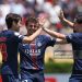 Vitinha #17, Lee Kang-in #19 and Joao Neves #87 of Paris Saint-Germain celebrate following the team's victory in the FIFA Club World Cup 2025 (Photo by Stu Forster/Getty Images)